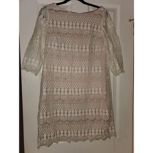 White lace dress with nude underlay